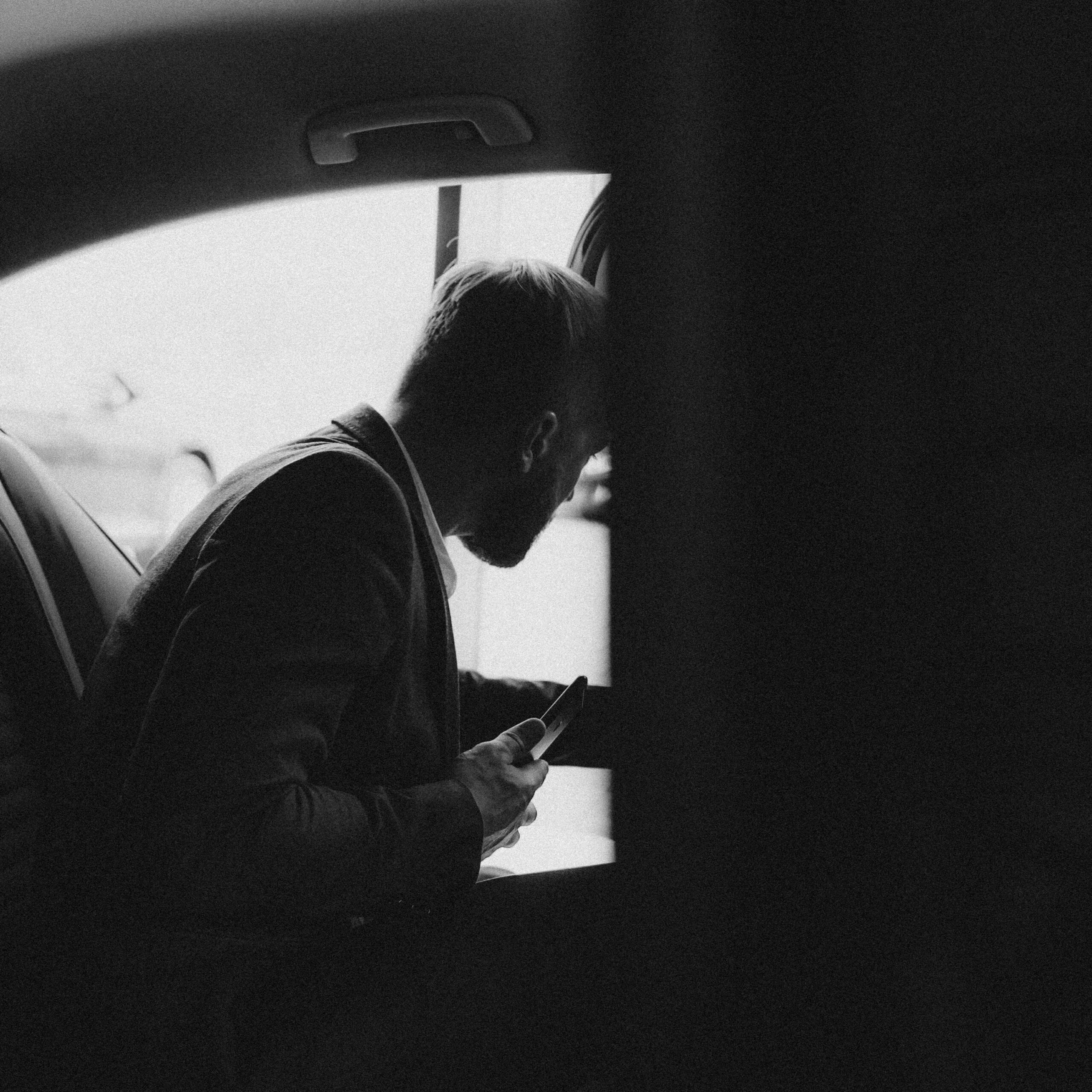 Man getting out of rental car