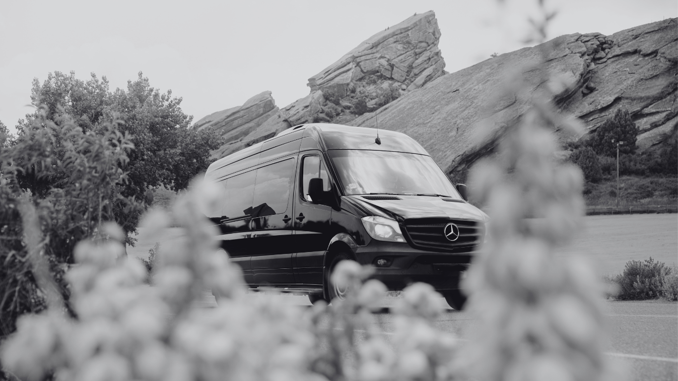 Untitled (Website) (2) Sprinter van in front of Red Rocks black and white